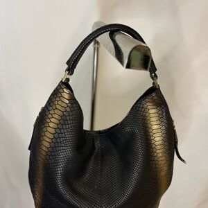 Calvin Klein luxury handbag purse. Black and gold with logo gold hardware